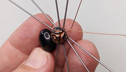 Wire ends are twisted together in two revolutions.